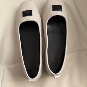 DKNY Women's Cream Loafers with Black Accents